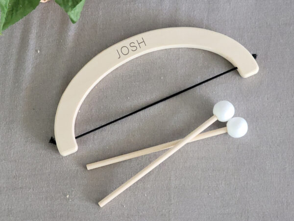 Wooden Bow and Arrows with styrofoam heads with Josh engraved/personalized on the bow.
