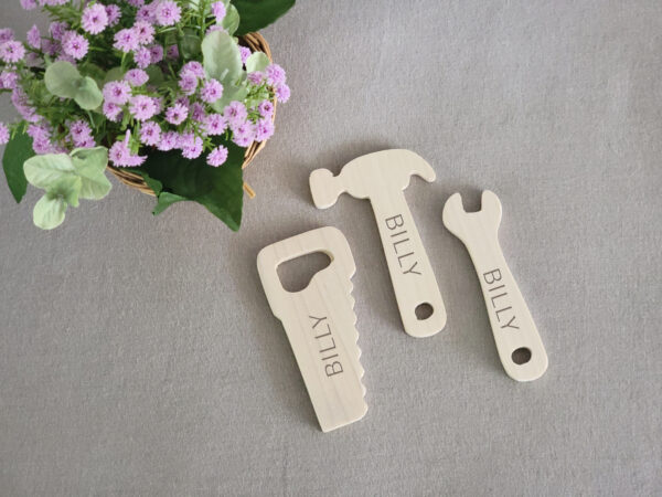 Wrench, Hammer, and Hand Saw with personalized names on each wooden tool
